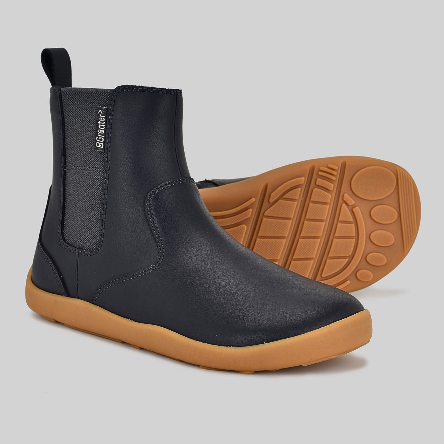 Pair Girls Navy Chelsea Boots showing sole